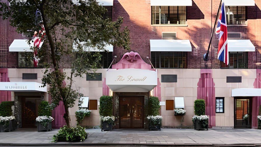 Luxurious residential suite featuring a working wood-burning fireplace and European furnishings at The Lowell Hotel.