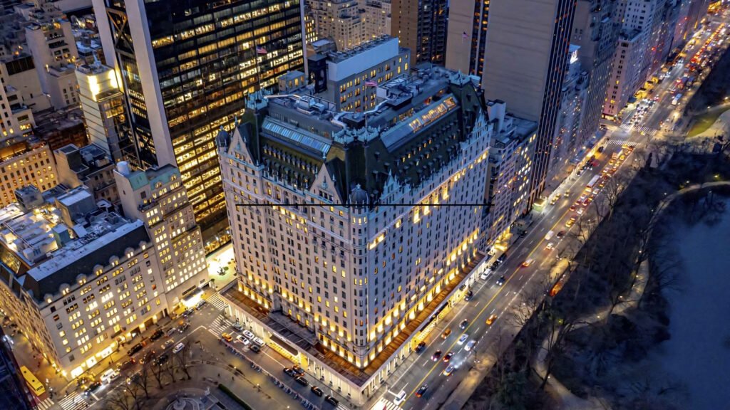 Grand exterior facade and entrance of The Plaza hotel on Fifth Avenue in New York City.