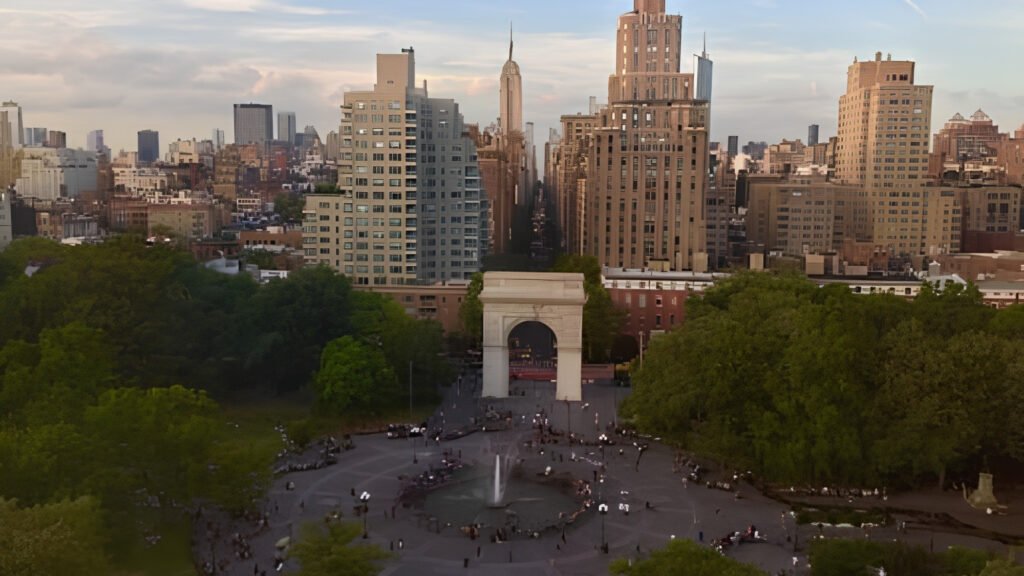 The iconic Washington Square Arch and central fountain in Washington Square Park, Greenwich Village.